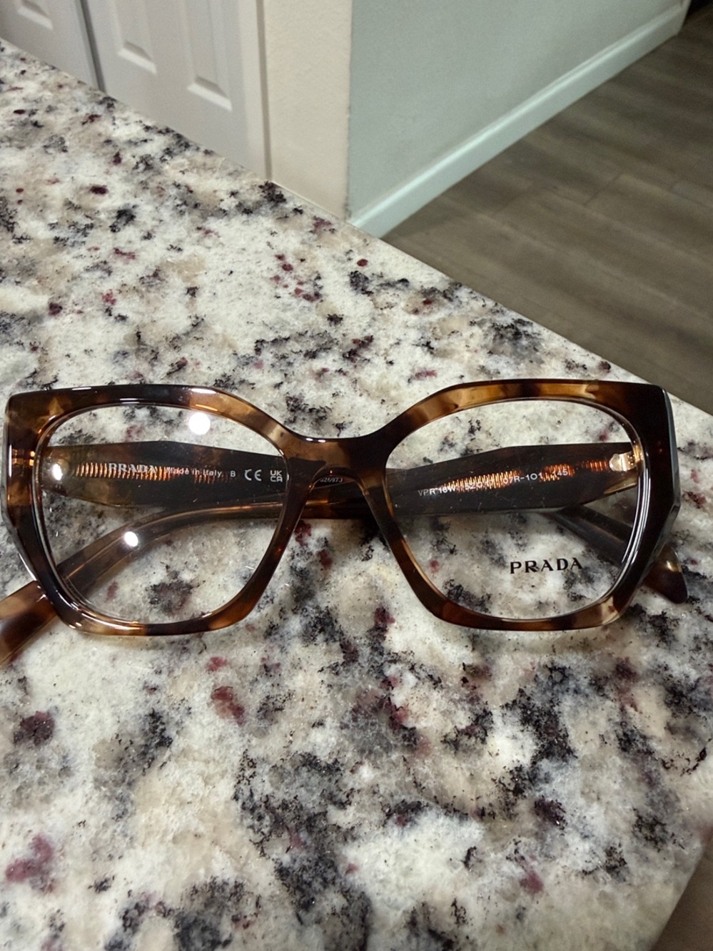 Prada Women's Tortoiseshell Square Frame Glasses in Brown